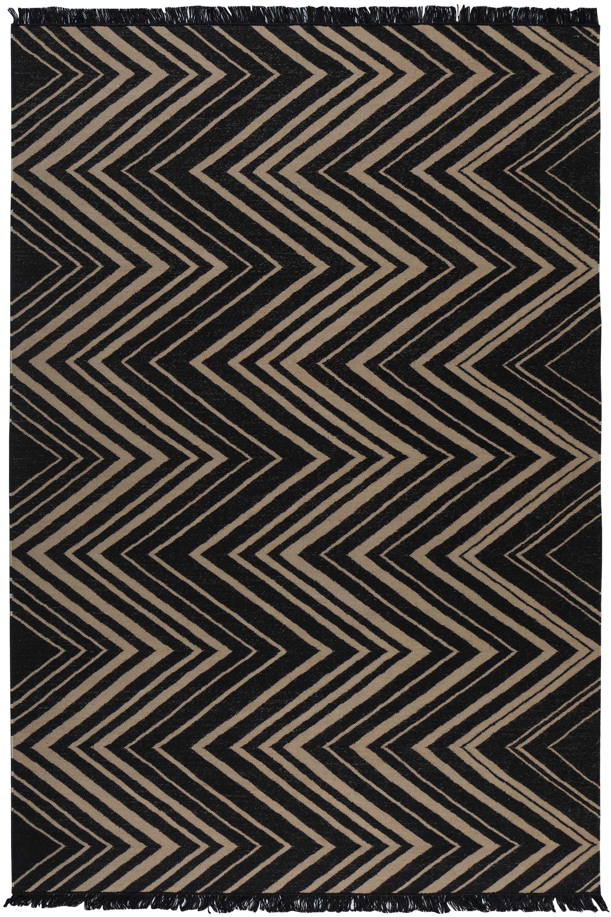 Vertical Zig-Zag Rug in Onyx-Sandstone, a zig zag pattern in mixed widths in black and taupe with a fringed edge. 