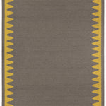 Waver Rug in Cardinal Yellow, a dark taupe field with a yellow flame stitch border. 