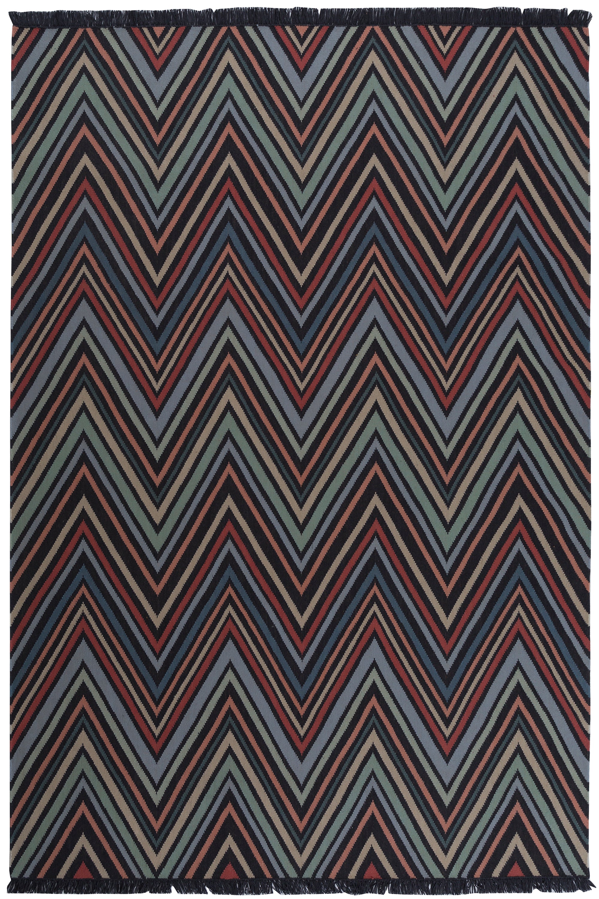 Full size To The Point Rug in Hessonite-Garnet-Slate, a zig zag pattern in red, blue coral with black, with a black fringed edge. 