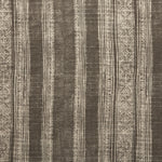 Woven fabric swatch in a striped pattern of intricate white lines over a washed charcoal background.